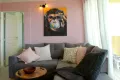 1_private-ferienwohnung-mit-meerblick-wohnzimmer-gemuetliche-sitzecke-laubergine-bellevue