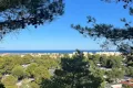 Blick vom Chemin de la Falaise über Narbonne-Plage bis zum Mittelmeer