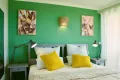 private-ferienwohnung-mit-meerblick-schlafzimmer-salbei-doppelbett-laubergine-bellevue